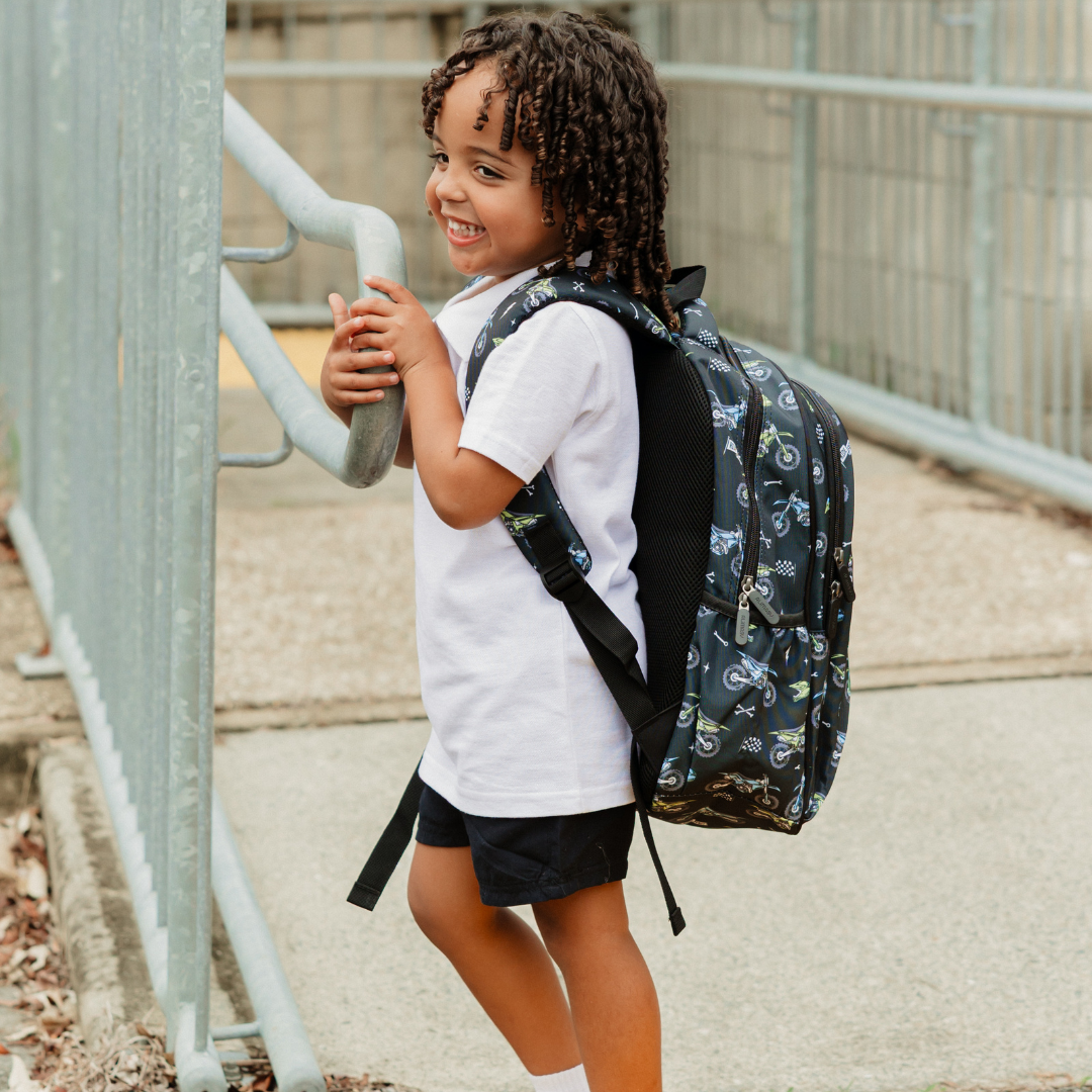 Motorcross Midsize Kids Backpack lifestyle image child wearing, lightweight waterproof school bag for boys and girls