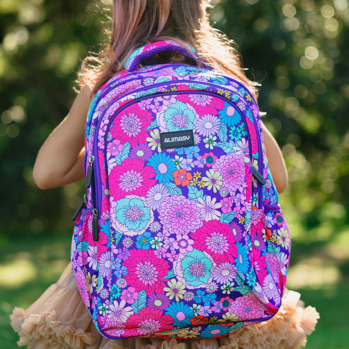 Summer Flowers Midsize Kids Backpack lifestyle image child wearing, lightweight waterproof school bag for boys and girls