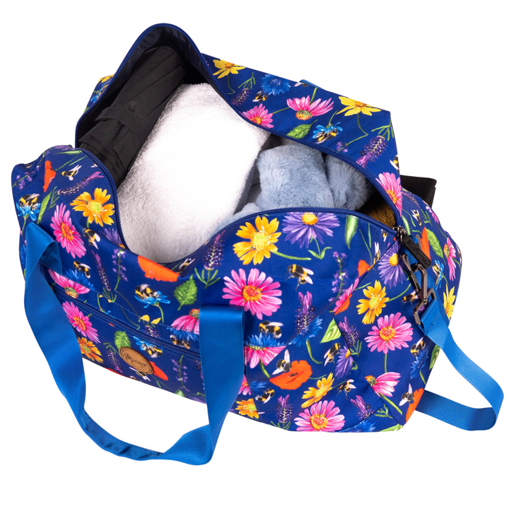 alimasy blue bees and wildflowers duffle bag open with clothes and towel