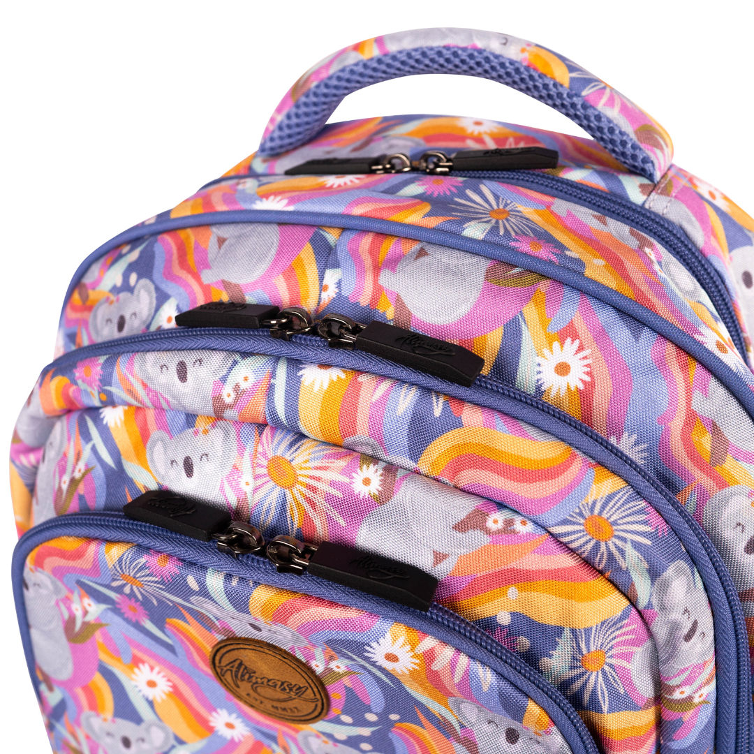 outside photo of alimasy rainbow colourful koala australian pattern kids backpack with 3 zips